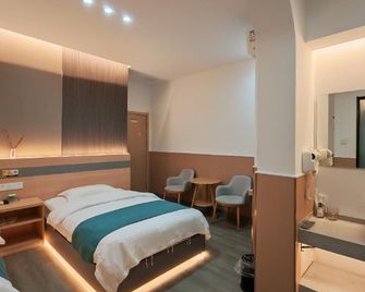 Ganquan Homestay (Jiujiang Lushan High-Speed Railway Station) - Jiujiang - Bedroom