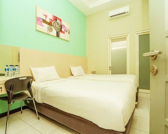 Ardhya Guesthouse Syariah by ecommerceloka - Surabaya