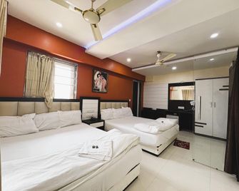 Hotel Big Boss Sea View Room - Digha - Schlafzimmer