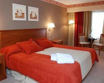 Howard Johnson by Wyndham Villa Maria Casino - Villa María - Schlafzimmer
