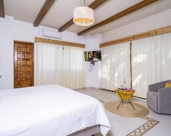 Mezcal Hostel - Cancún - Schlafzimmer