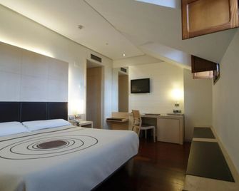 Hotel Mozart - ואיאדוליד - חדר שינה