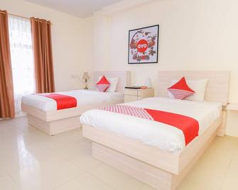 OYO 854 Ub Caisar Hotel - Banda Aceh - Bedroom