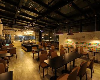 Borrman Hotel Kunming Changshui Airport Center - Kunming - Restaurante