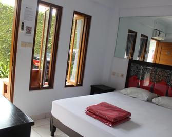 Rose Inn - Pangandaran - Habitació