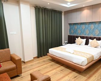 Hotel Olive Crown - Лакнау - Спальня