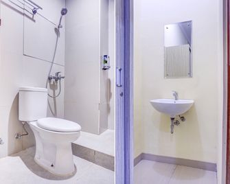 Indah Residence Syariah Mitra RedDoorz - Jakarta