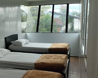 Cozzy D'Sobahan Resort - Wonosobo - Bedroom