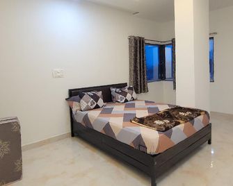 Shree Vitthal Bhakt Nivas - Pandharpur - Bedroom