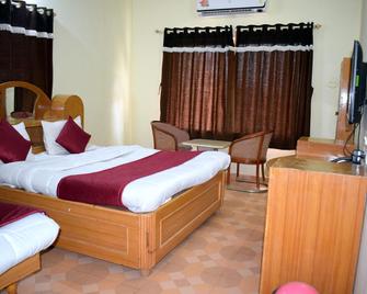 The Manas Cottage - Saputara - Camera da letto