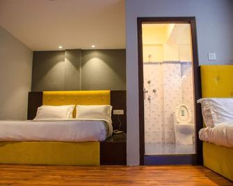 Olive By Tej Hotels And Resorts - Darjiling - Schlafzimmer