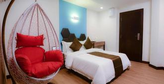 Memoire Hornbill Hotel - Kuching - Bedroom