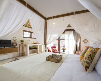 Calma Ubud Suite & Villas - אובוד - חדר שינה