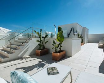 Sercotel Sevilla Guadalquivir Suites - Sevilla - Balcón