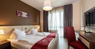Empress Hotel - Munich - Bedroom
