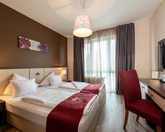 Empress Hotel - מינכן - חדר שינה