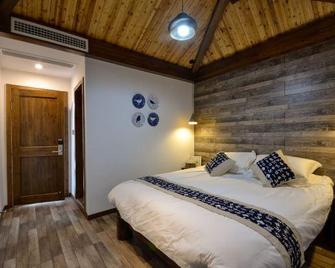 Congqianman Inn - Lishui - Спальня
