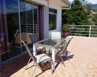 Supercostarica - Grecia - Balcony
