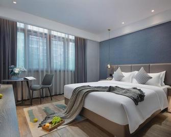 Poyang Hotel - Jingdezhen - Slaapkamer