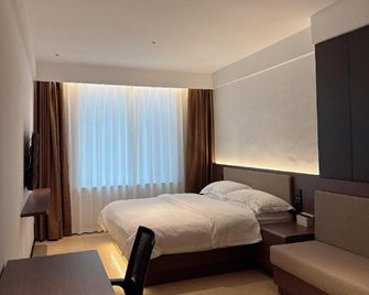 Pine Villa Hotel - Baishan - Bedroom