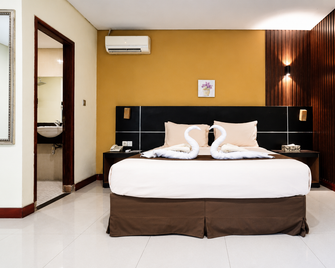 Dgria Hotel Syariah - Serang City - Ložnice
