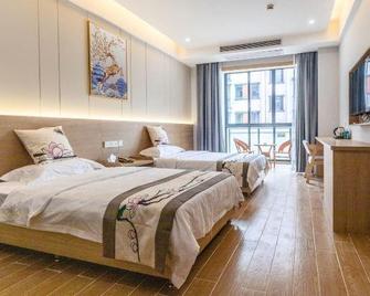 Xinyu Holiday Hotel (Huangshan Tunxi) - Chuang-šan - Ložnice