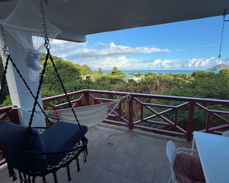 BVI HEAVEN on beach. Full resort. Batchelor room with huge balcony ocean view - Parham Town - ระเบียง