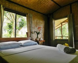 El Nido Viewdeck Cottages - אל נידו - חדר שינה