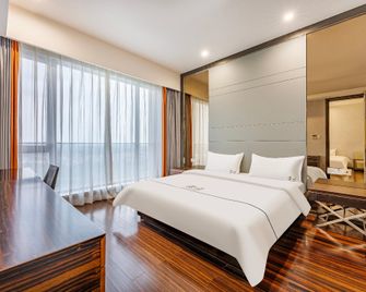 Poly World Trade Weifuton Apartment (Guangzhou Tower Pazhou Exhibition Centre Branch) - Guangzhou - Schlafzimmer