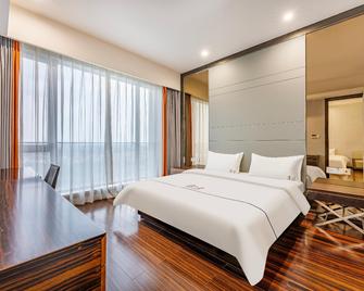 Poly World Trade Weifuton Apartment (Guangzhou Tower Pazhou Exhibition Centre Branch) - Cantón - Habitación