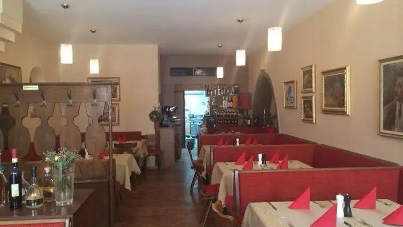 Weinstube Heigl Restaurante Pizzeria Puc