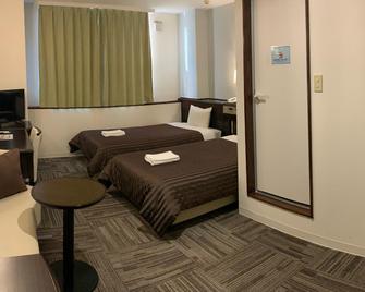 Royal Inn Toko - Izumi - Bedroom