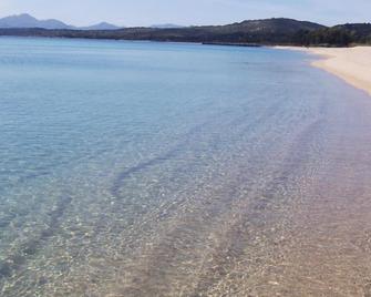 Campeggio Villaggio Sos Flores - Tortolì - Strand