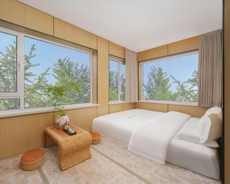 Songjing Hotel (Dongguan Street Branch near Railway Station) - 大連 - 寝室