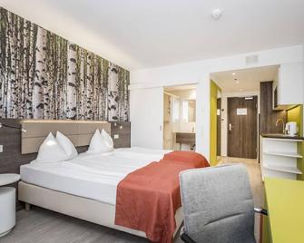 Eco Suite Hotel - Salzburgo - Habitación