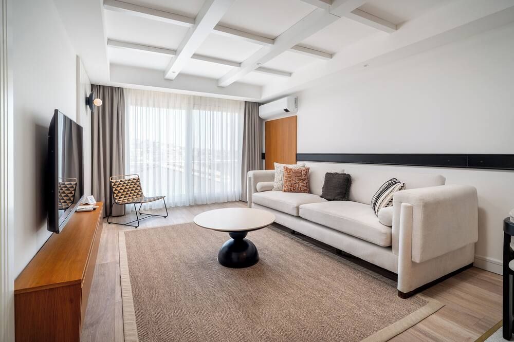 داليان ريزيدنس آند سويتس - سسمى - غرفة معيشة