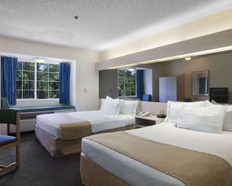 Microtel Inn & Suites by Wyndham Palm Coast I-95 - Palm Coast - Bedroom