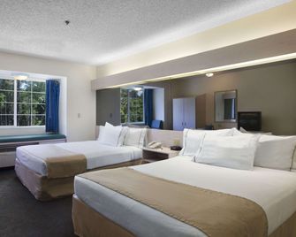 Microtel Inn & Suites by Wyndham Palm Coast I-95 - Palm Coast - Bedroom