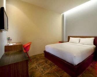 Plan B Hotel - Padang - Habitación