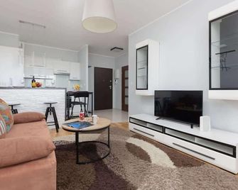Warsaw Young City Apartment by Noclegi Renters - Varsovia - Sala de estar