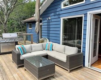 Feathery Pines cottage with sauna and sunset views - Nobel - Patio