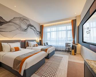 Rezen Hotel Harbin Institute of Technology Feilong - هاربين - غرفة نوم