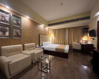 Hotel O2 Oxygen - Calcutta - Slaapkamer