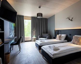 Hotelli Sodankylä - Sodankylä - Slaapkamer