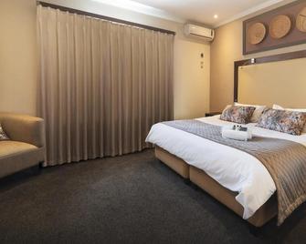 Graham Hotel - Grahamstown - Schlafzimmer