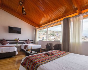 هوتل كاباك إن سان بلاس - كوسكو - غرفة نوم