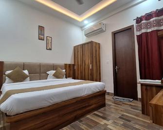 Hotel Taj Sarovar - Agra - Slaapkamer