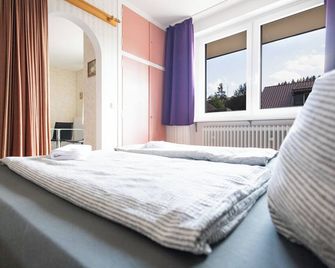 Apartmenthaus am Waldrand- Küche - Frühstück - Balkon - Wildemann - Slaapkamer