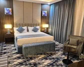 فندق أمان المحالة - أبها - غرفة نوم