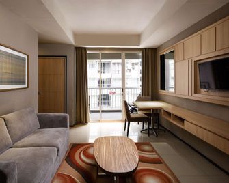 Golden Tulip Balikpapan Hotel & Suites - Balikpapan - Huiskamer
